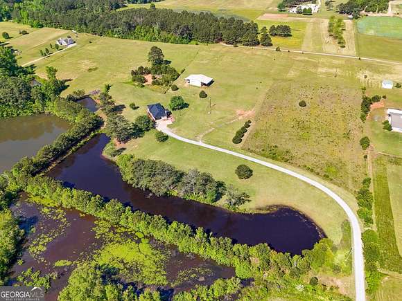10.6 Acres of Land with Home for Sale in Williamson, Georgia