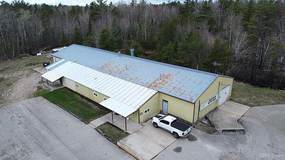 9.4 Acres of Improved Commercial Land for Sale in Manistique, Michigan