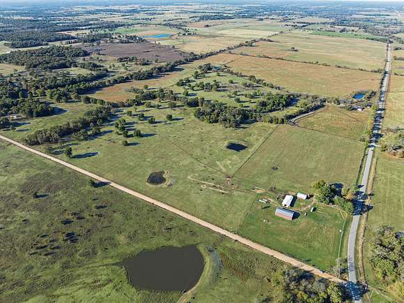 20 Acres of Land for Sale in Gravette, Arkansas