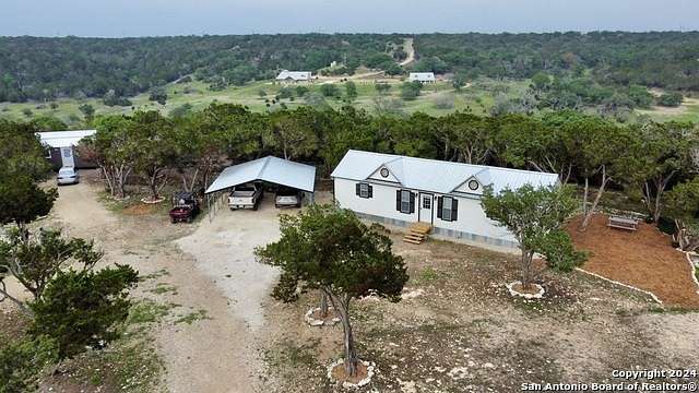 9.65 Acres of Residential Land with Home for Sale in Ingram, Texas