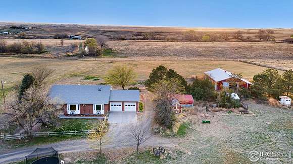 11.4 Acres of Land with Home for Sale in Fort Morgan, Colorado