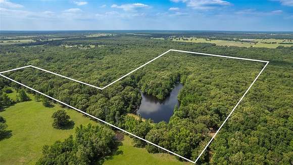 86.3 Acres of Agricultural Land with Home for Sale in Dike, Texas