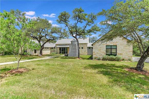 7.9 Acres of Residential Land with Home for Sale in Wimberley, Texas