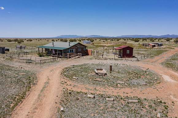 71.4 Acres of Recreational Land with Home for Sale in McIntosh, New Mexico