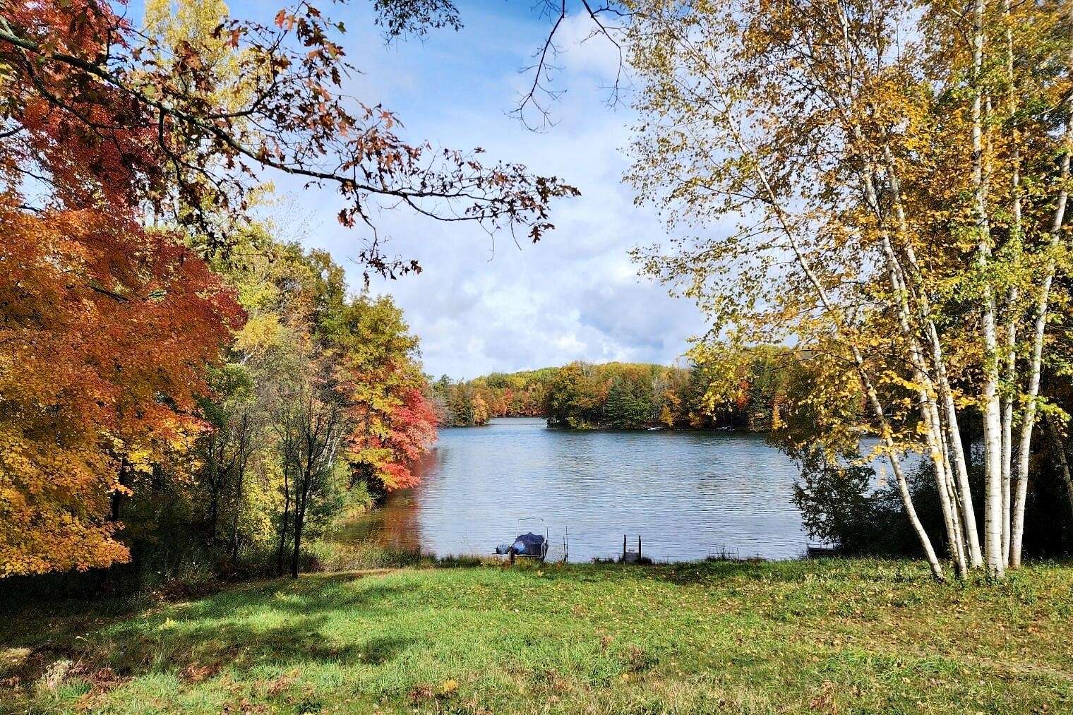 0.5 Acres of Residential Land for Sale in Canadian Lakes, Michigan