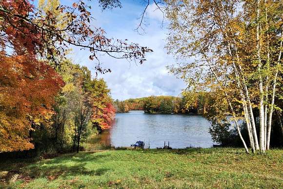 0.5 Acres of Residential Land for Sale in Canadian Lakes, Michigan