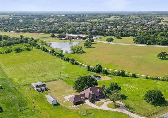 10.07 Acres of Land with Home for Sale in Granbury, Texas