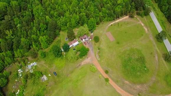 9.1 Acres of Residential Land with Home for Sale in Rose Bud, Arkansas
