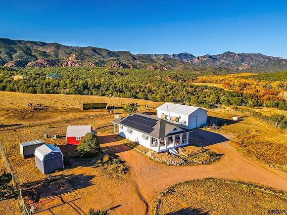 73.6 Acres of Agricultural Land with Home for Sale in Penrose, Colorado