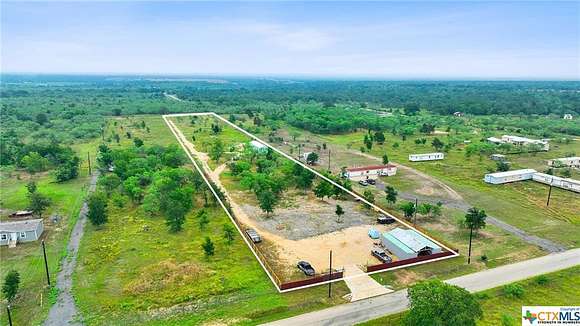 3.9 Acres of Residential Land with Home for Sale in Luling, Texas