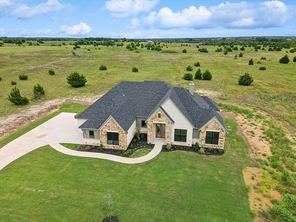 12.352 Acres of Land with Home for Sale in Milford, Texas