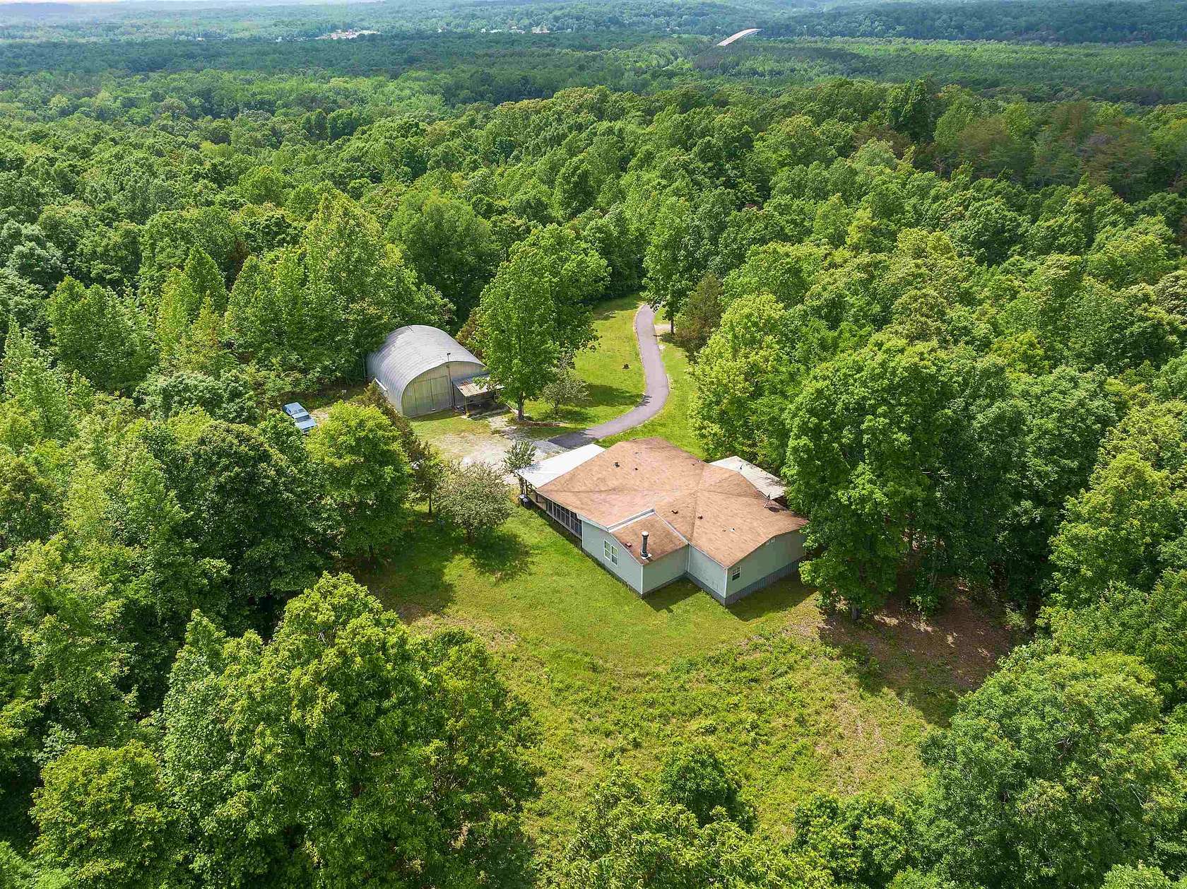 14.9 Acres of Land with Home for Sale in Linden, Tennessee