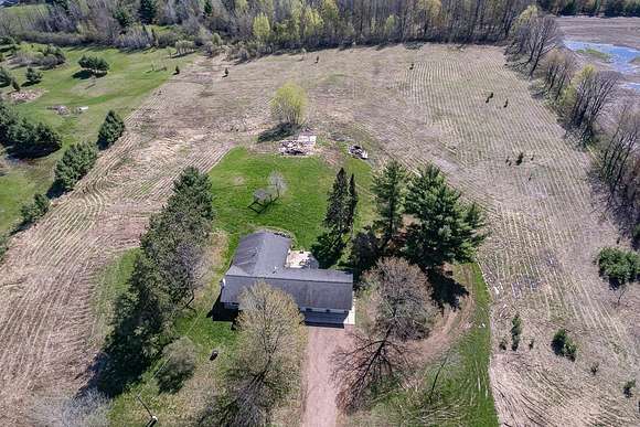7.1 Acres of Residential Land with Home for Sale in Merrill, Wisconsin