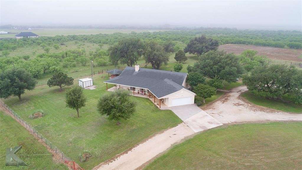 10 Acres of Residential Land with Home for Sale in Ovalo, Texas