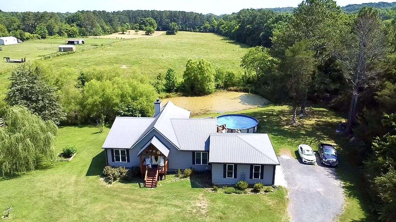 16.17 Acres of Land with Home for Sale in Oldfort, Tennessee