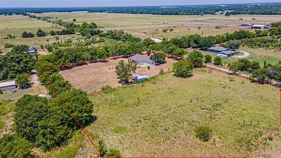 2.1 Acres of Residential Land with Home for Sale in Scurry, Texas