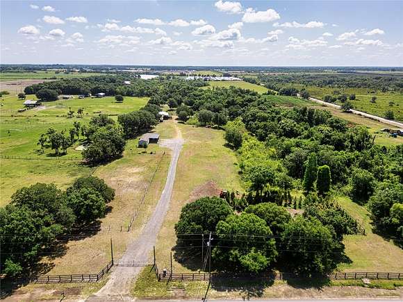 9.6 Acres of Land with Home for Sale in Wimauma, Florida