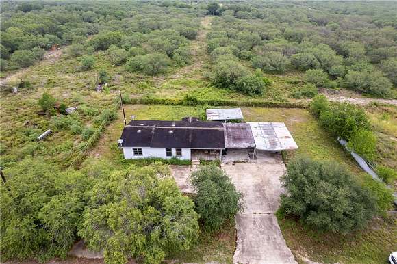 32.02 Acres of Recreational Land with Home for Sale in Alice, Texas