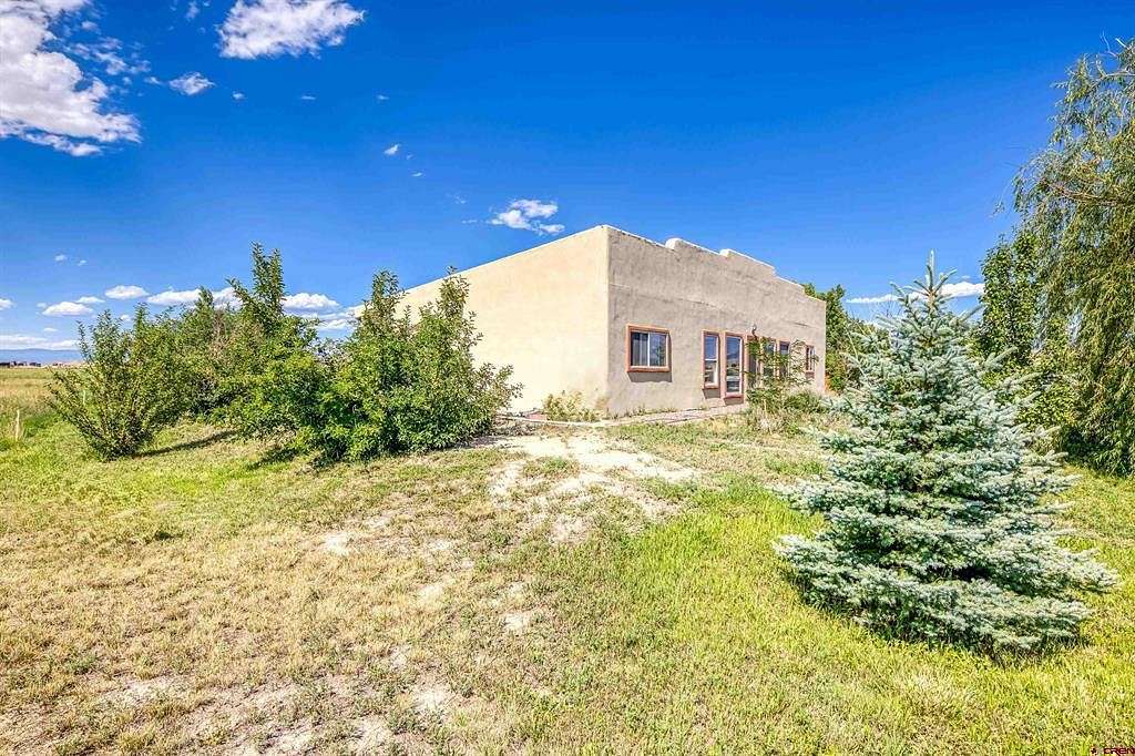 24.62 Acres of Land with Home for Sale in Montrose, Colorado